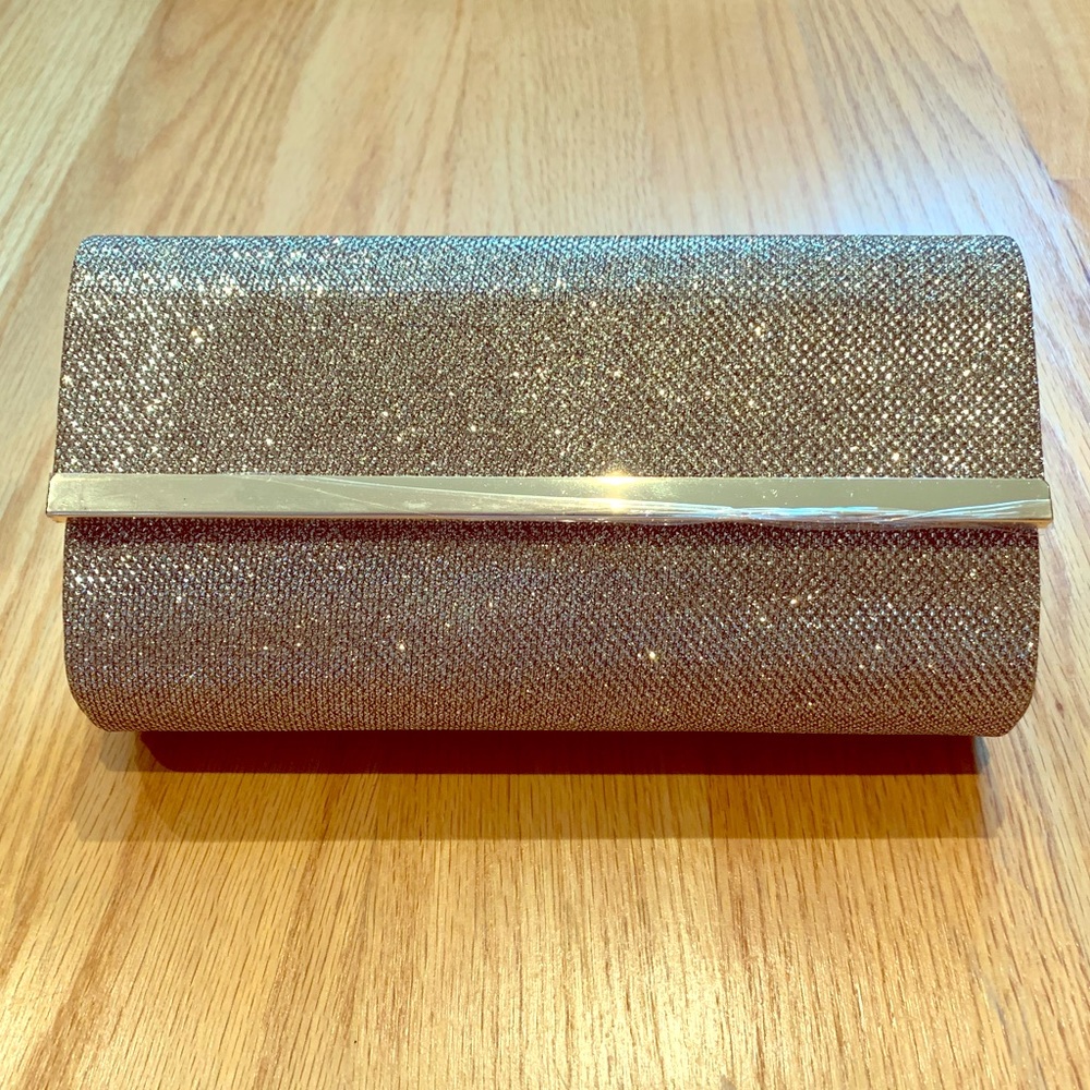 Gold glitter clutch by Bareminerals